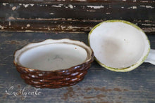 Load image into Gallery viewer, Porcelain chicken on nest in color.
